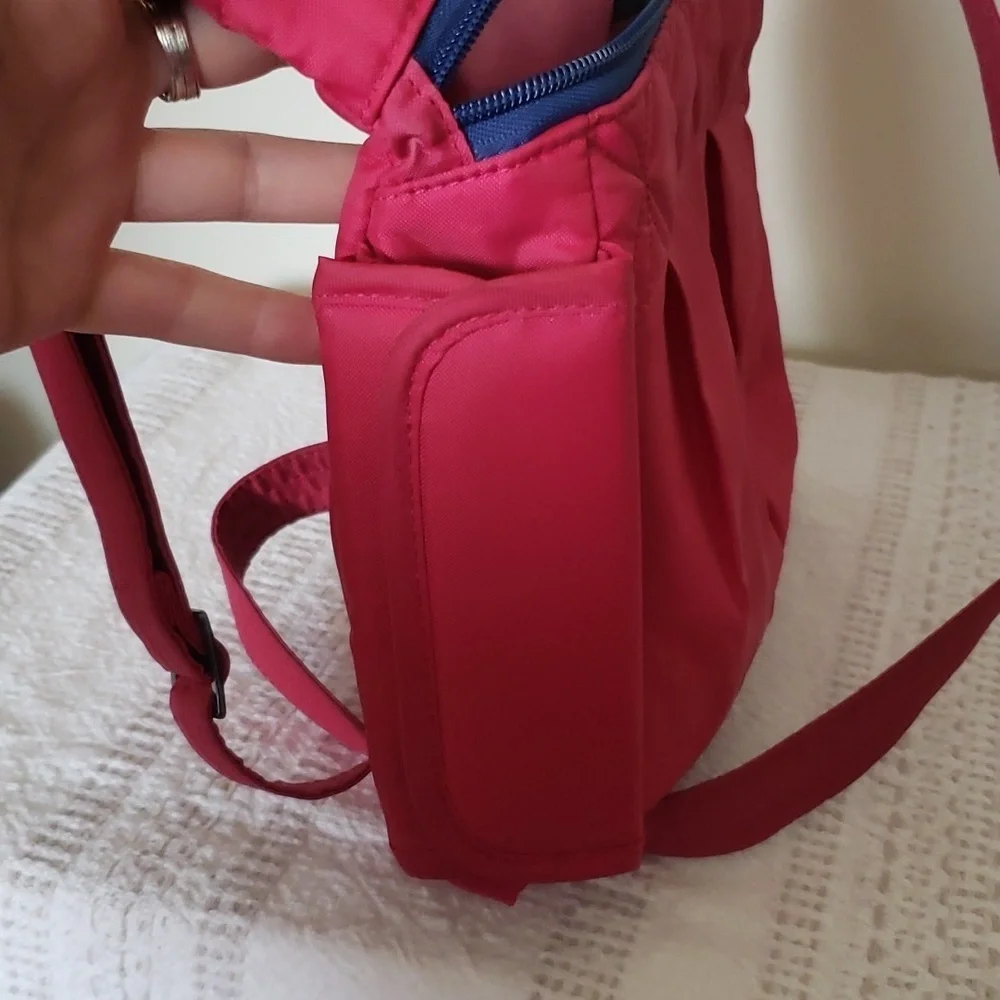 Lug 'swing' crossbody bag, hot pink, 3 sectioned pockets.